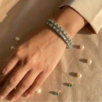 Emerald Lumina Green & White CZ Eternity Bangle in 925 Sterling Silver