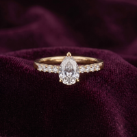 Pear Cut Solitaire Ring with Pavé Band in 925 Sterling Silver