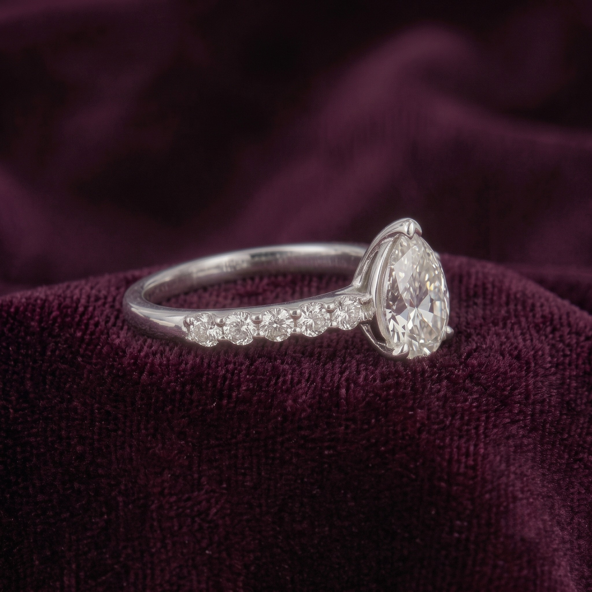 Pear Cut Solitaire Ring with Pavé Band in 925 Sterling Silver