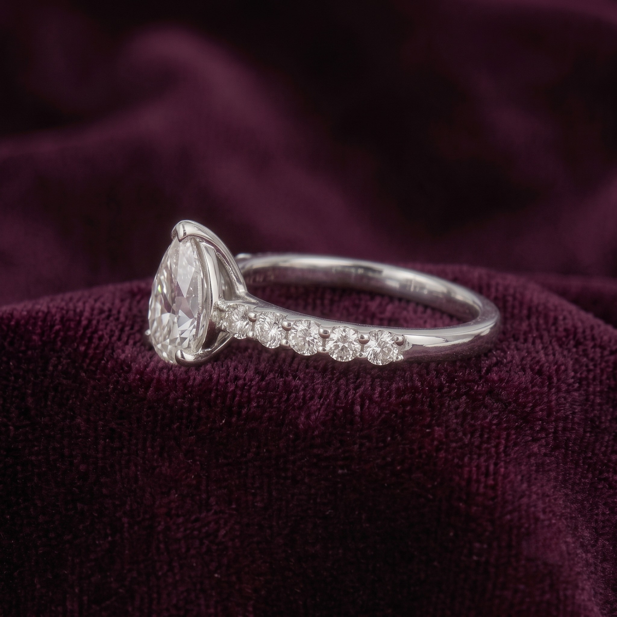 Pear Cut Solitaire Ring with Pavé Band in 925 Sterling Silver