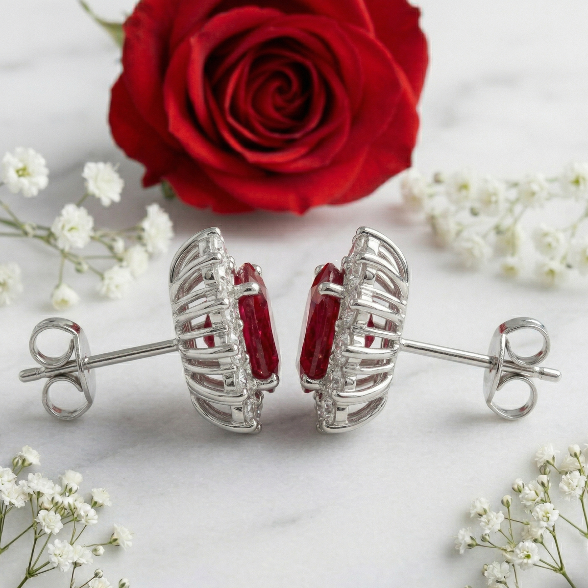Majestic Ruby Oval Halo Studs - 925 Sterling Silver