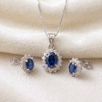 Oval Blue Sapphire Halo Pendant Set in 925 Sterling Silver