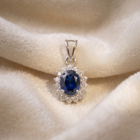 Oval Blue Sapphire Halo Pendant Set in 925 Sterling Silver